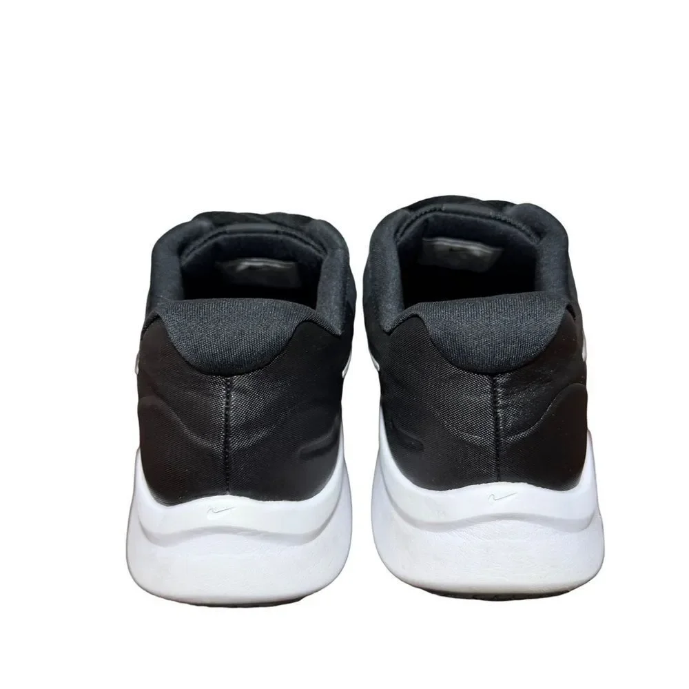 Nike women’s Black and White Low-Top Running Shoe size 5.5Y